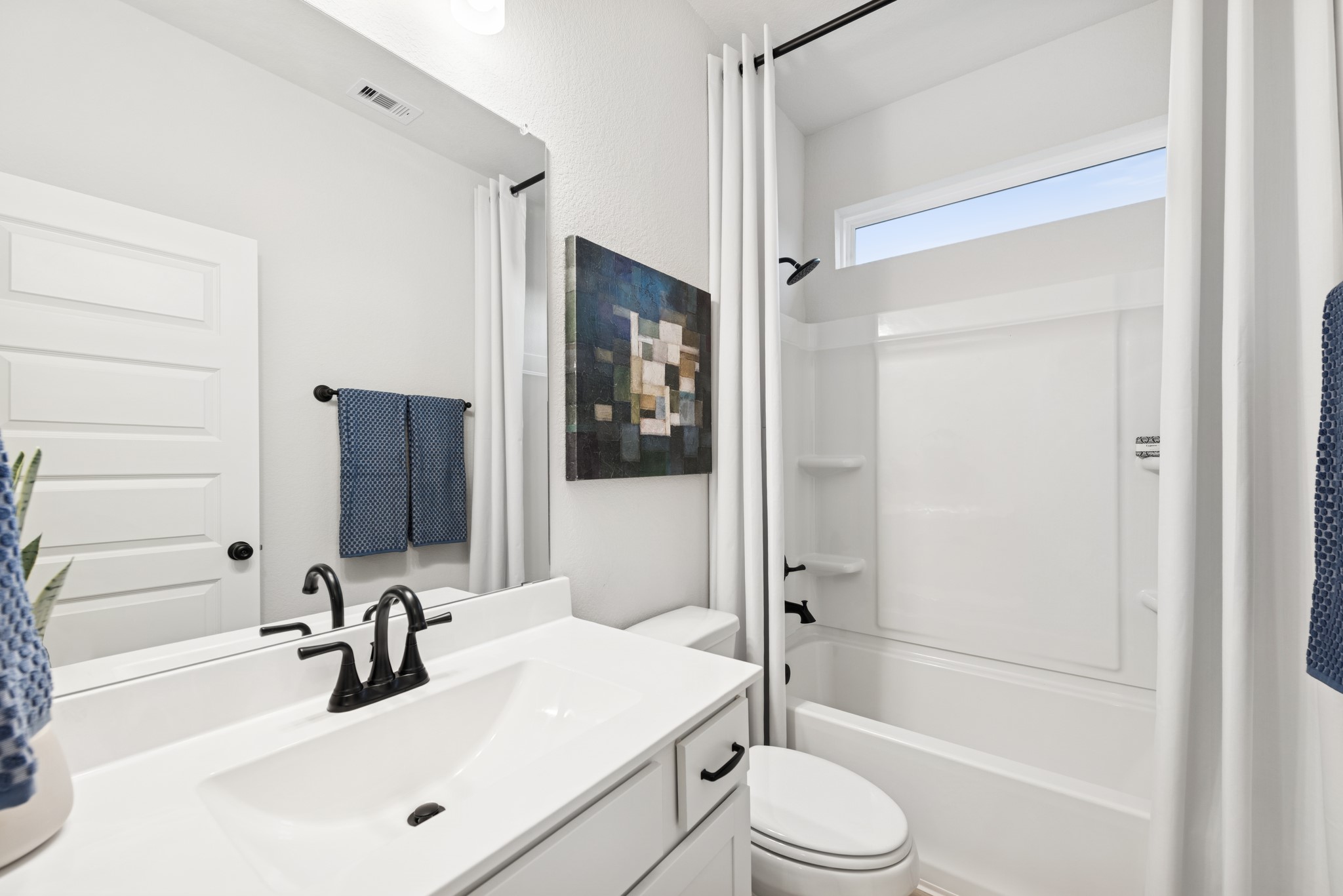 9726 Enclave Ridge Road Willis, TX 77318 - Photo 21 of 25 a bathroom with a sink toilet tub and shower