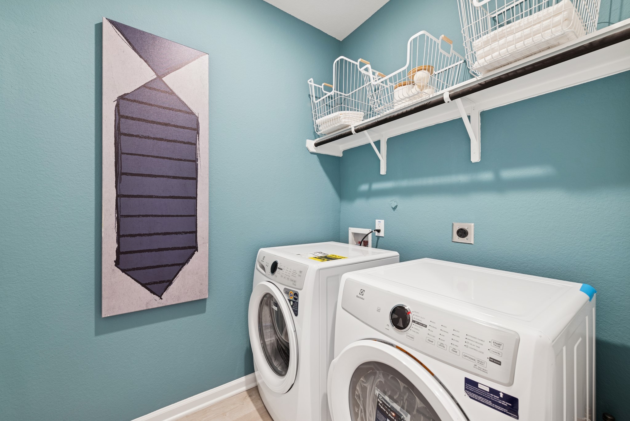 9726 Enclave Ridge Road Willis, TX 77318 - Photo 22 of 25 a utility room with dryer and washer