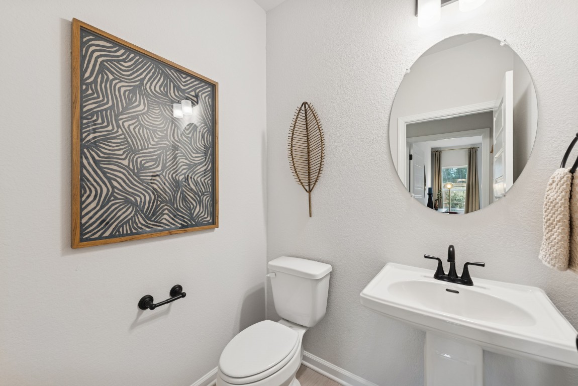 9726 Enclave Ridge Road Willis, TX 77318 - Photo 23 of 25 The Princeton II- Powder Bath. Staged model home shown for illustration only; actual features, colors, and upgrades may vary.