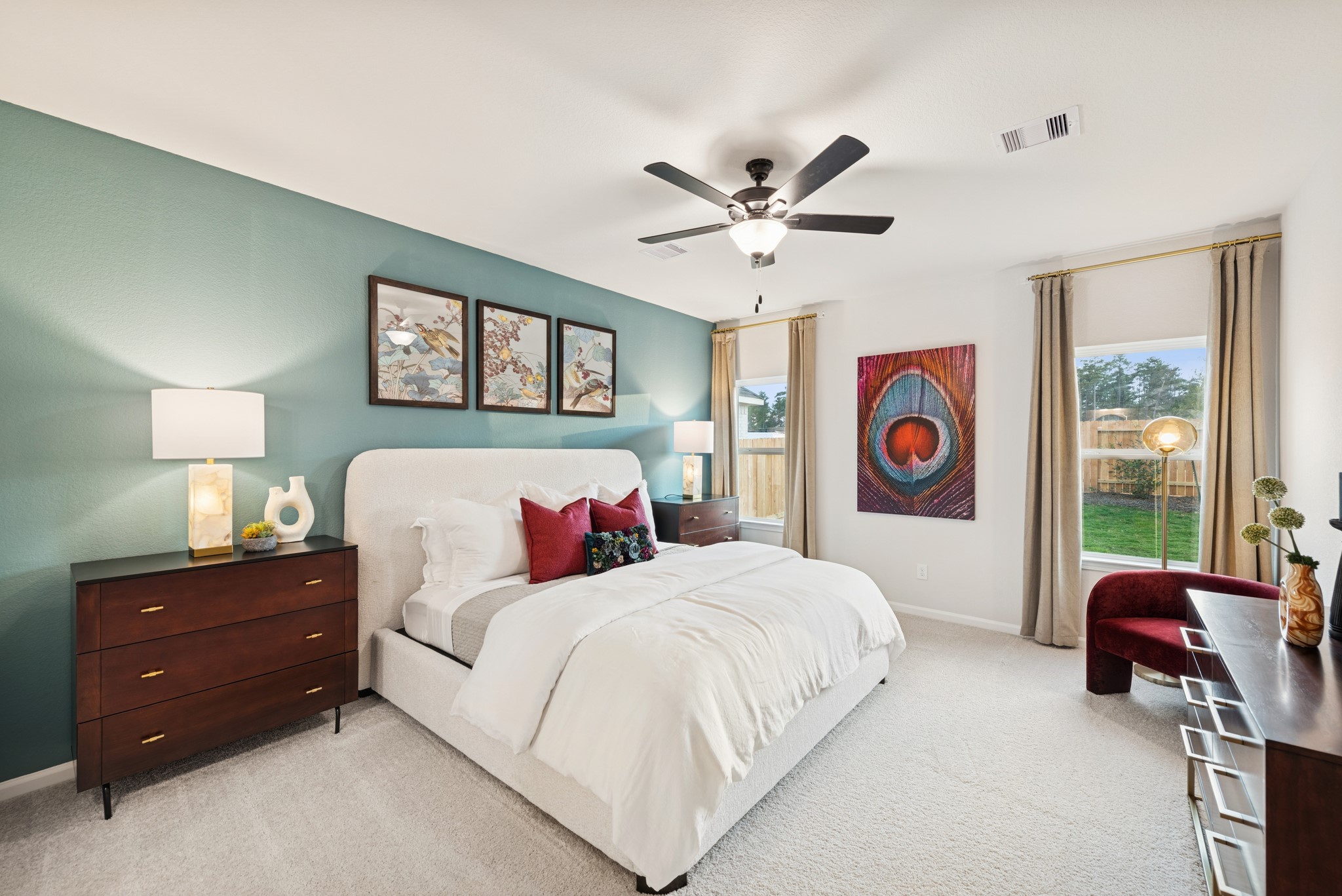 9726 Enclave Ridge Road Willis, TX 77318 - Photo 10 of 25 a bedroom with a bed and dresser