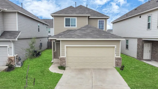 a front view of house with yard