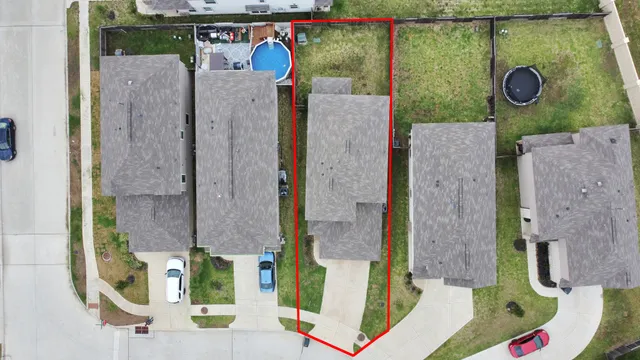 aerial view of a house with a swimming pool