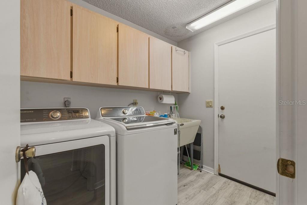 8873 Southwest 200th Circle Dunnellon, FL 34431 - Photo 23 of 61 a utility room with dryer and washer