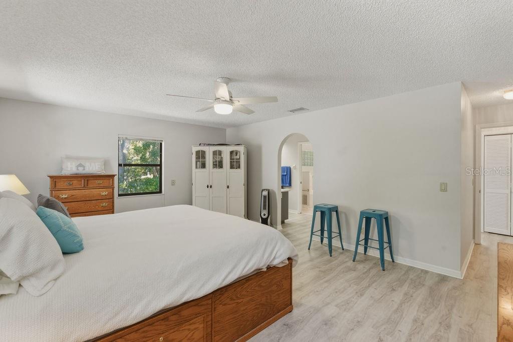 8873 Southwest 200th Circle Dunnellon, FL 34431 - Photo 25 of 61 a living room with furniture and wooden floor