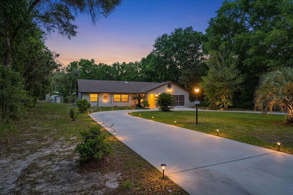 8873 Southwest 200th Circle Dunnellon, FL 34431 - Photo 3 of 61 a view of outdoor space yard deck and lake view