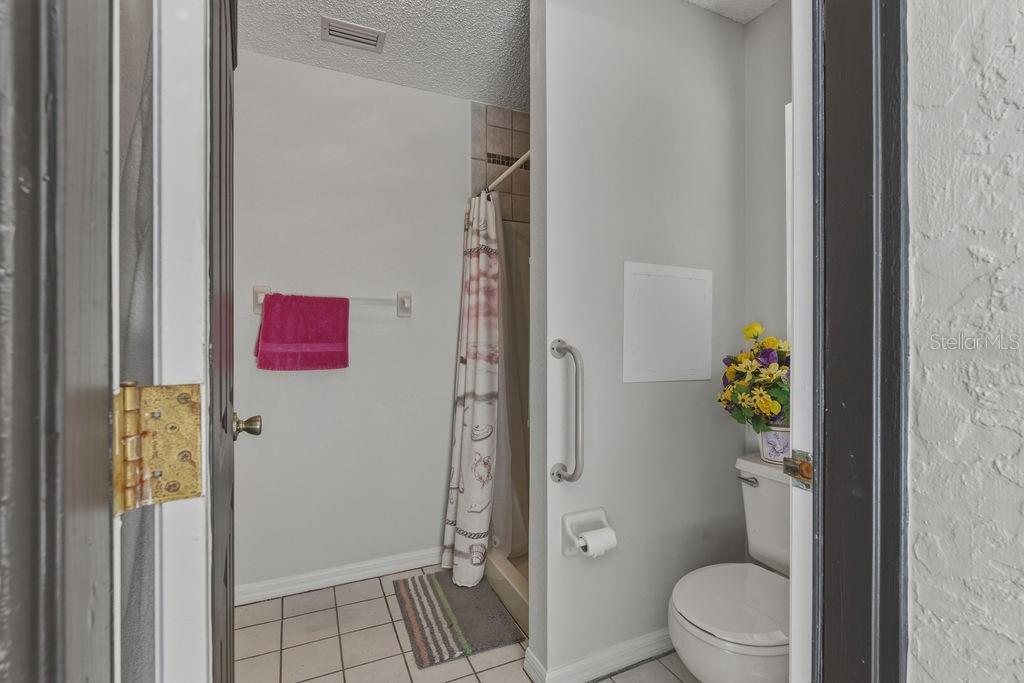 8873 Southwest 200th Circle Dunnellon, FL 34431 - Photo 33 of 61 a bathroom with a toilet and a shower