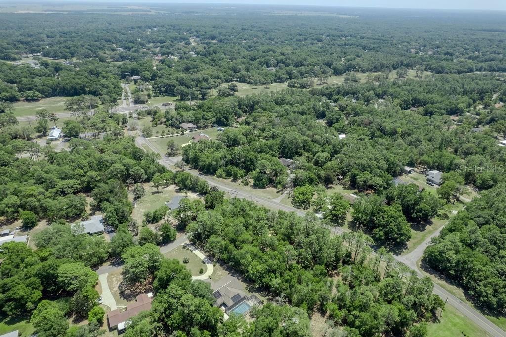 8873 Southwest 200th Circle Dunnellon, FL 34431 - Photo 37 of 61 an aerial view of residential house with outdoor space and trees all around