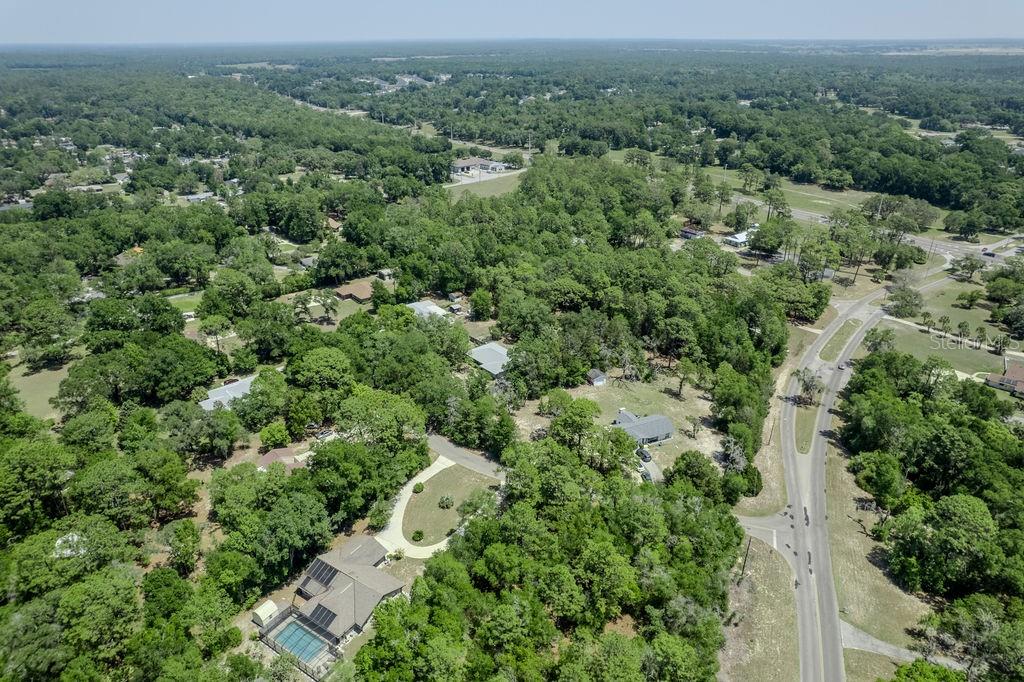 8873 Southwest 200th Circle Dunnellon, FL 34431 - Photo 38 of 61 an aerial view of a house with a yard