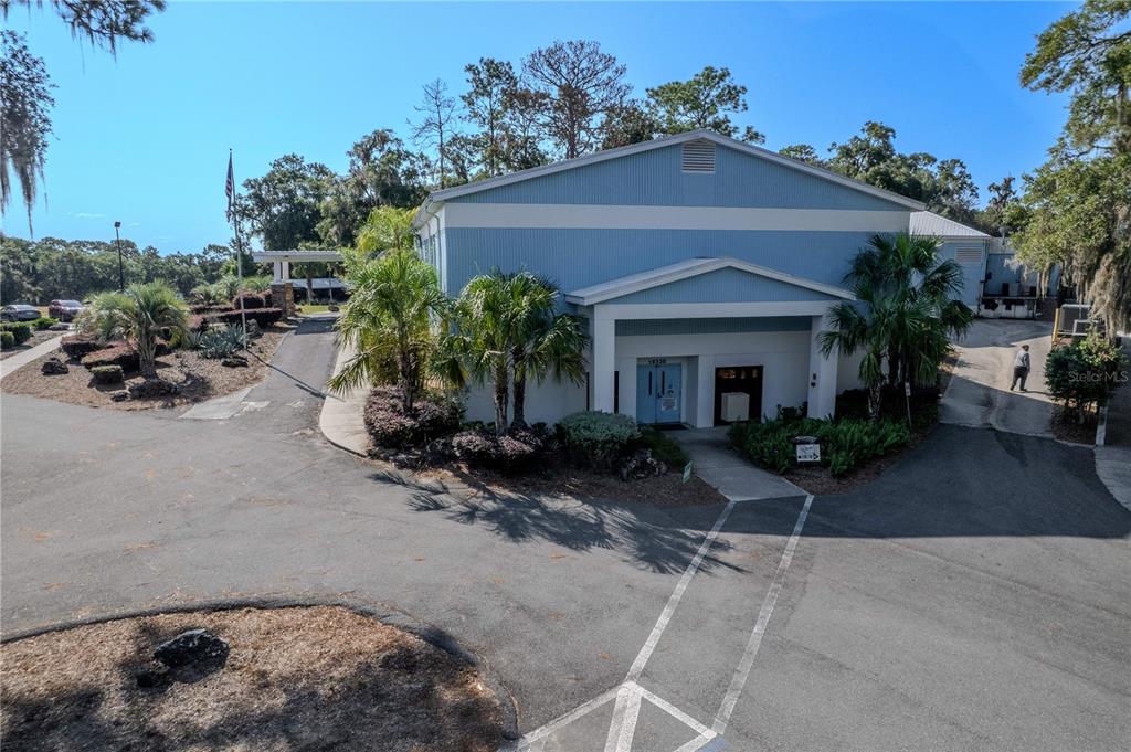 8873 Southwest 200th Circle Dunnellon, FL 34431 - Photo 45 of 61 a front view of a house with garden