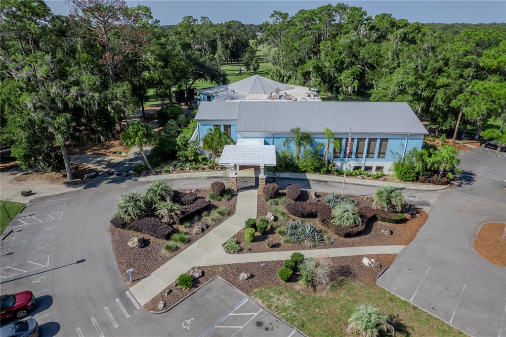 8873 Southwest 200th Circle Dunnellon, FL 34431 - Photo 46 of 61 an aerial view of a house with yard and green space