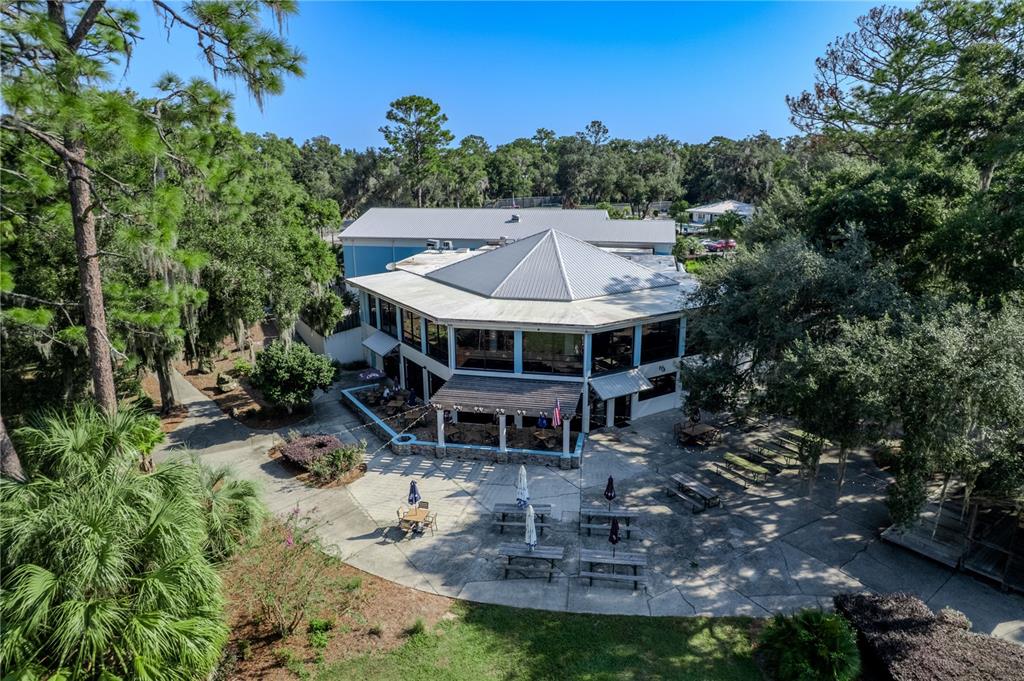 8873 Southwest 200th Circle Dunnellon, FL 34431 - Photo 47 of 61 a aerial view of a house with a yard