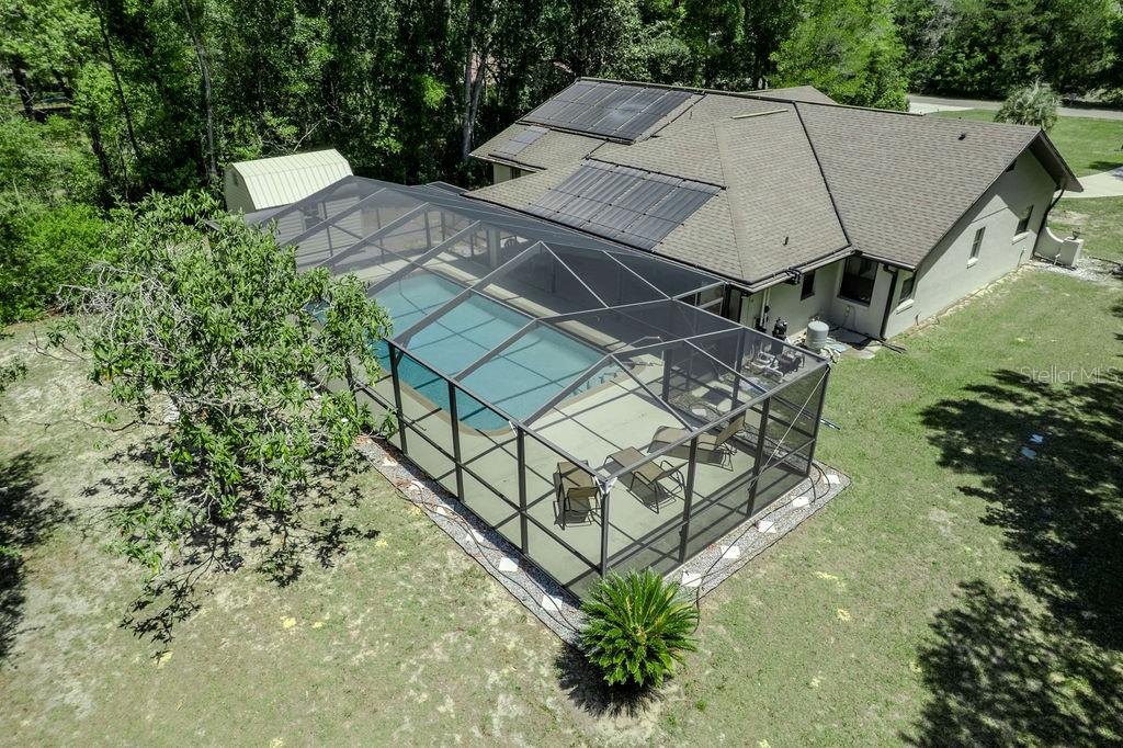 8873 Southwest 200th Circle Dunnellon, FL 34431 - Photo 7 of 61 an aerial view of a house with balcony and garden