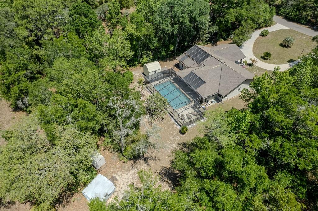 8873 Southwest 200th Circle Dunnellon, FL 34431 - Photo 8 of 61 an aerial view of a house with yard and outdoor seating