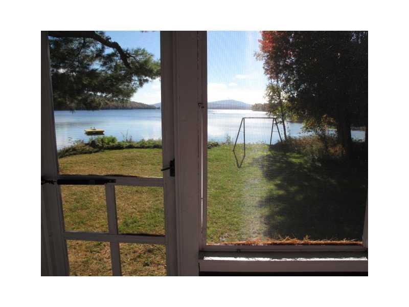 58 Shore Road Rangeley, ME 04970 - Photo 27 of 33 Yard/Garden. View from screen porch.