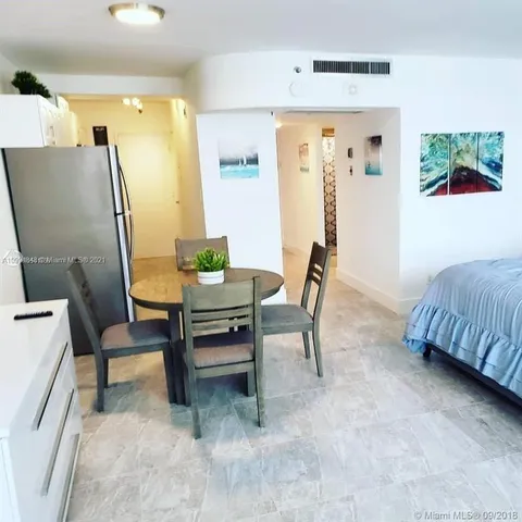 a view of a livingroom with furniture and a couch