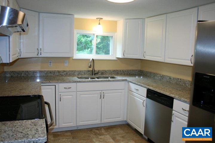 9 Ruth Hollow Madison, VA 22727 - Photo 17 of 35 a kitchen with granite countertop a sink a stove and a granite counter top