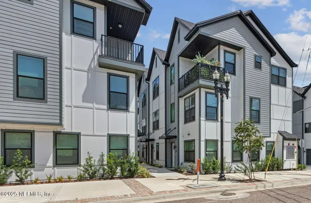 a view of a building with a street