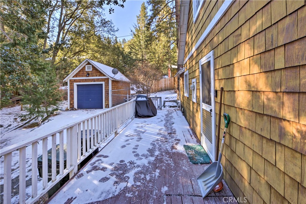 1069 Eagle Road Wrightwood, CA 92397 - Photo 19 of 24 a view of a house with wooden fence