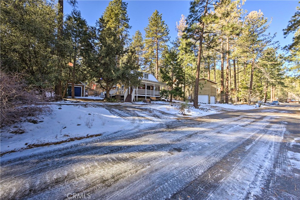 1069 Eagle Road Wrightwood, CA 92397 - Photo 23 of 24 a front view of a house with a yard
