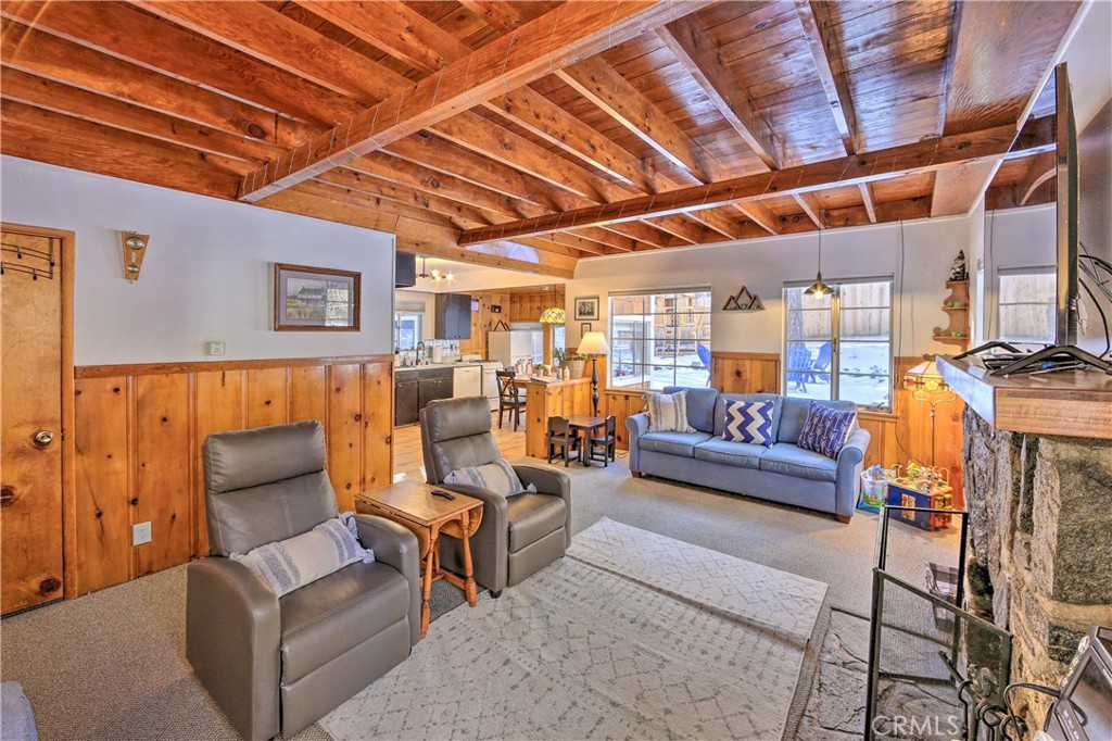 1069 Eagle Road Wrightwood, CA 92397 - Photo 5 of 24 a living room with furniture and a ceiling fan