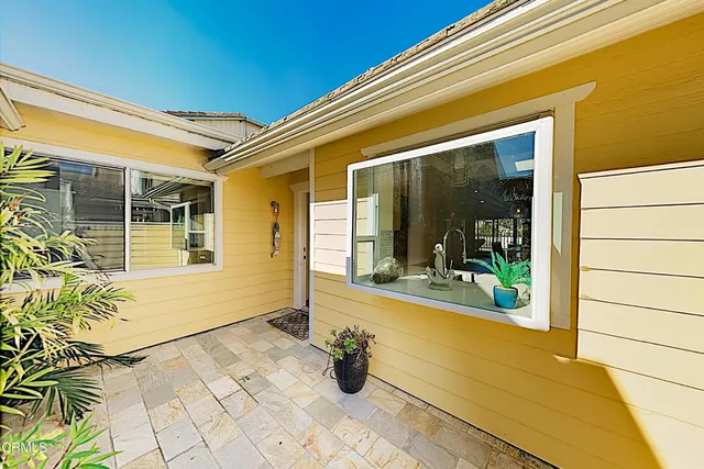 a view of a entryway door front of house