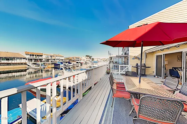 a view of a balcony with chairs