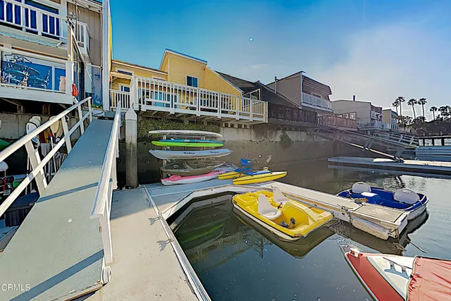 a view of swimming pool with outdoor seating and a couch