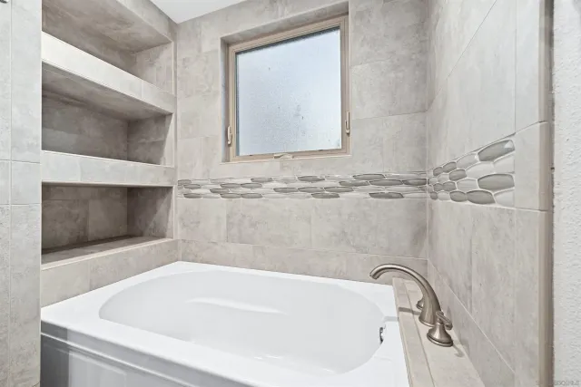 a bathroom with a tub