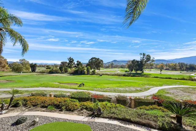 a view of a golf course with a park