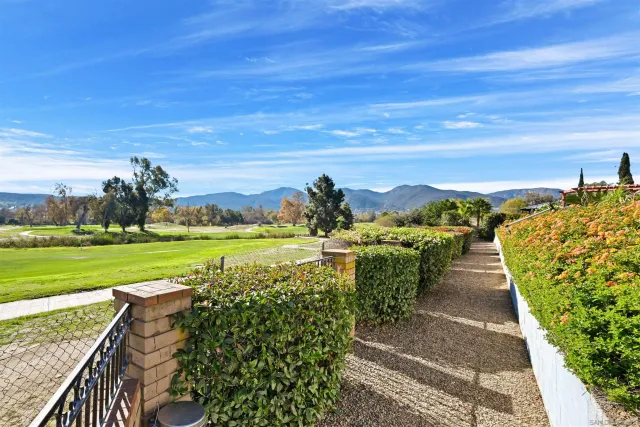 a view of a lake with a garden