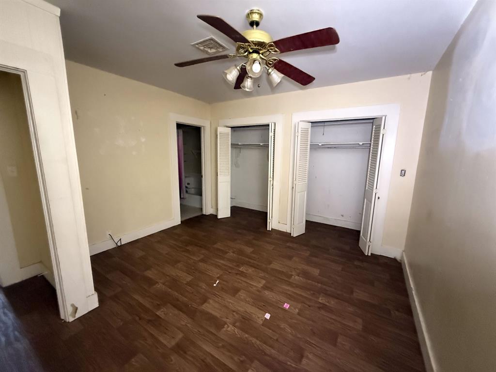 100 Smith Street Naples, TX 75568 - Photo 17 of 30 wooden floor in an empty room