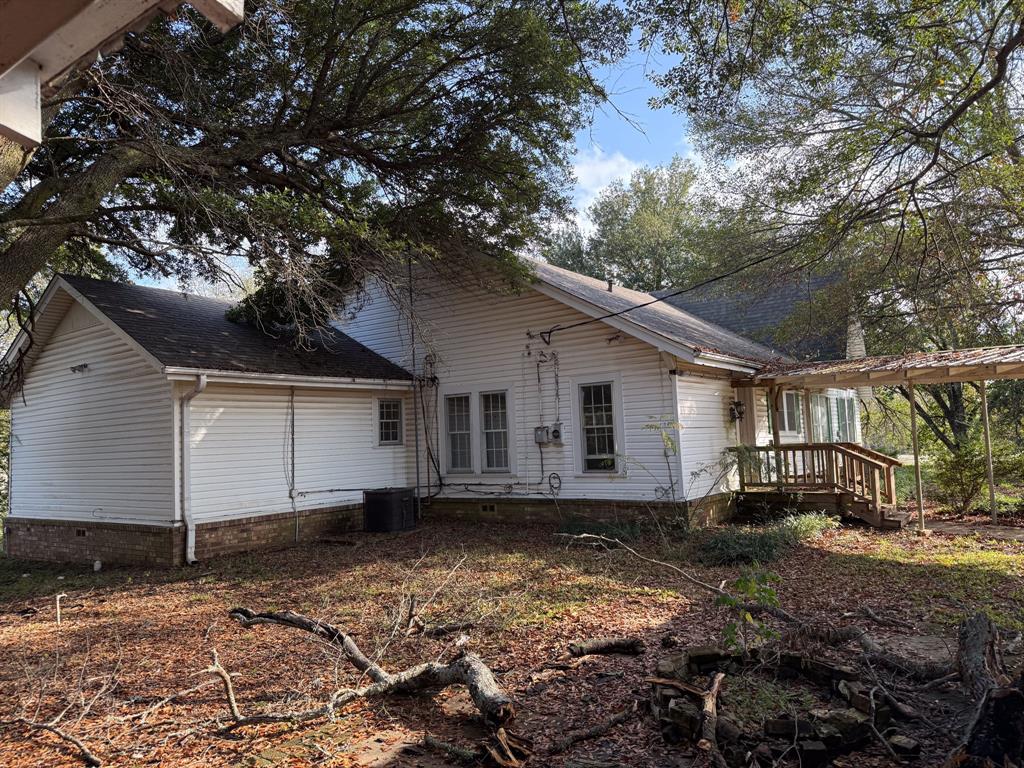 100 Smith Street Naples, TX 75568 - Photo 25 of 30 a house view with a backyard space