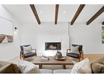 a living room with furniture and rug