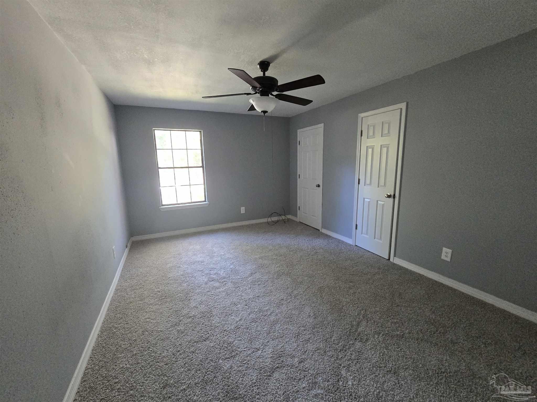 111 Cotton Creek Road McDavid, FL 32568 - Photo 17 of 30 a view of an empty room with a window