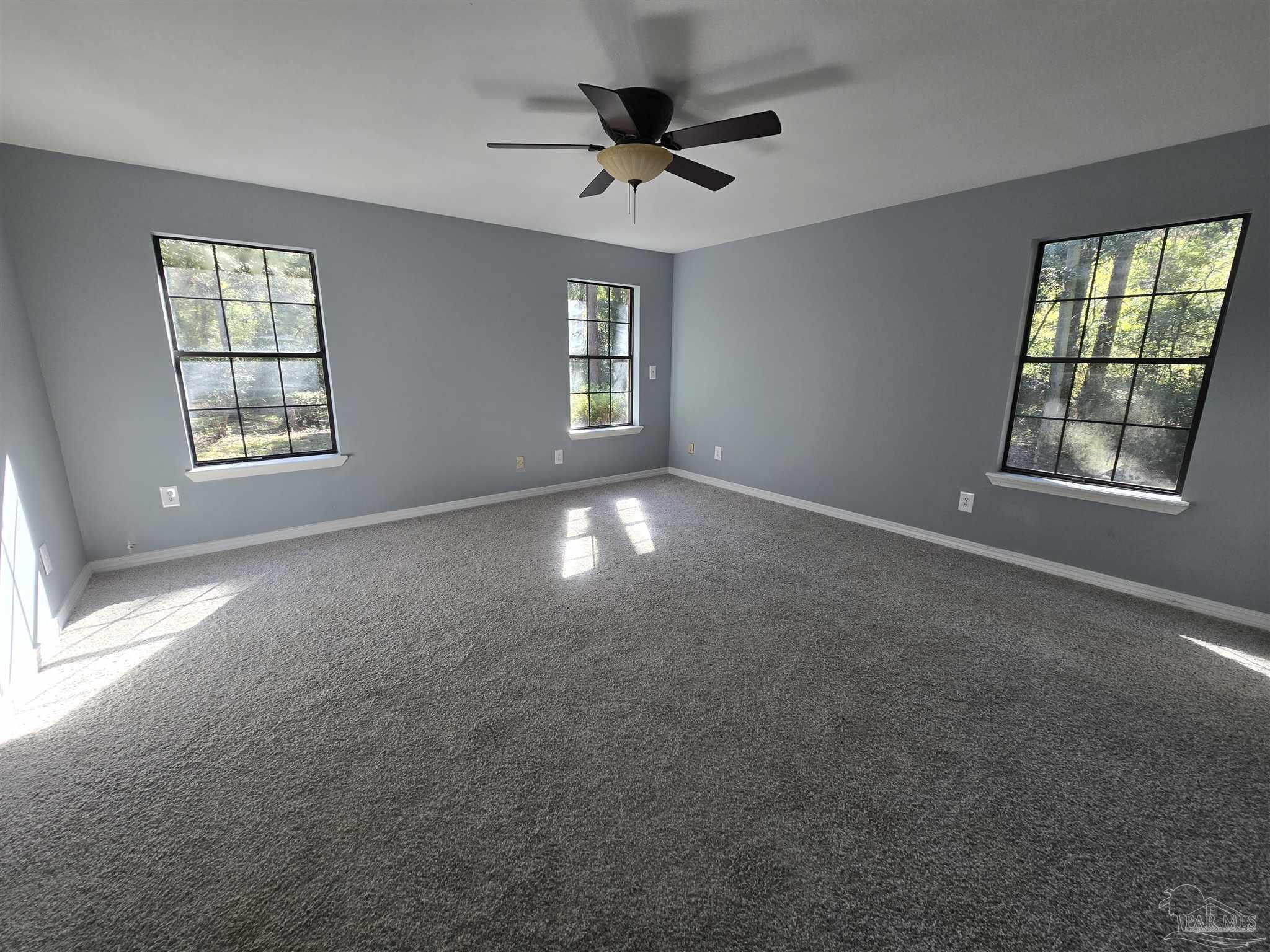 111 Cotton Creek Road McDavid, FL 32568 - Photo 10 of 30 a view of an empty room with a window