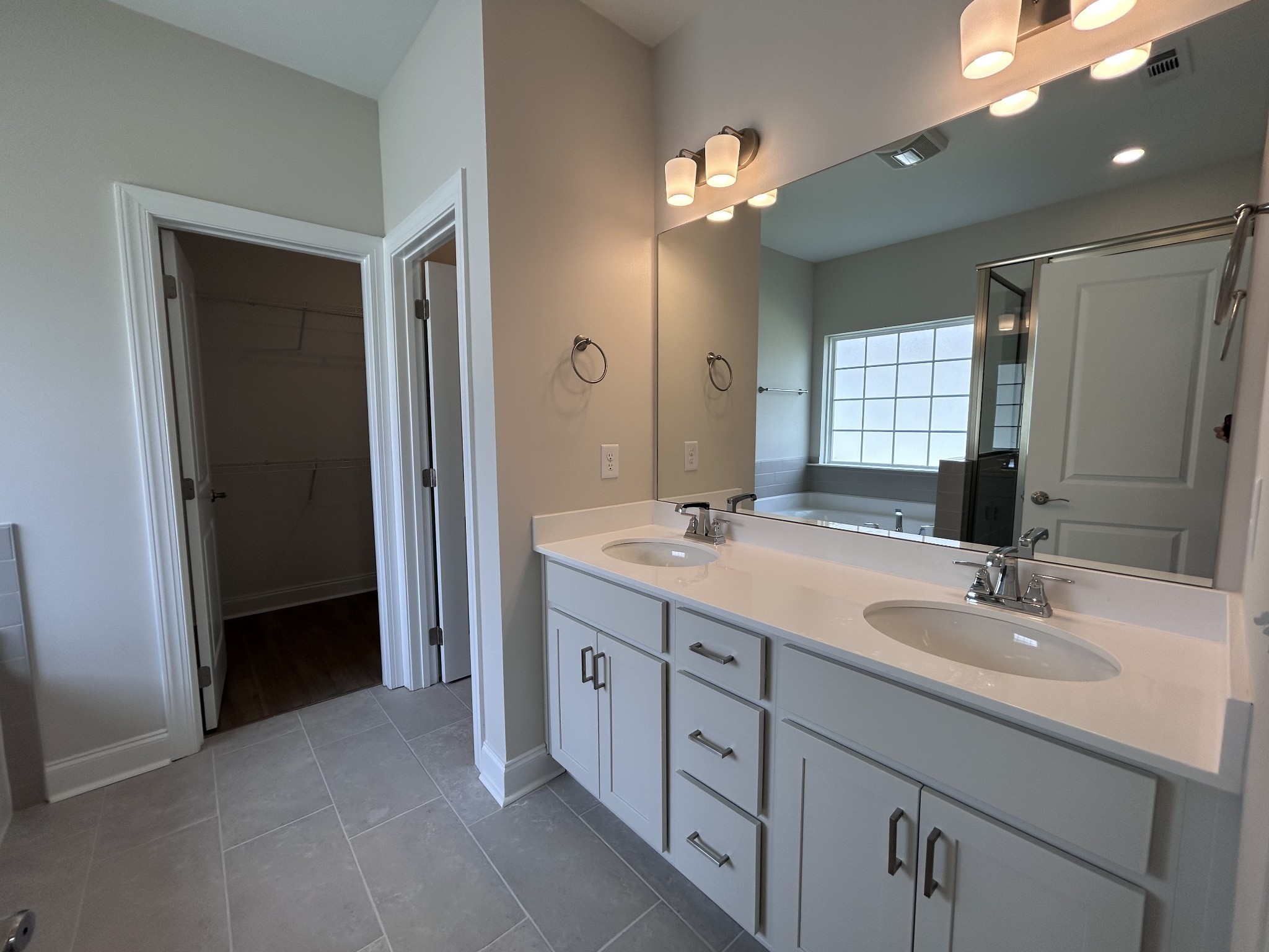 6502 Ripple Ridge Columbia, TN 38401 - Photo 22 of 52 a bathroom with a double vanity sink mirror and double