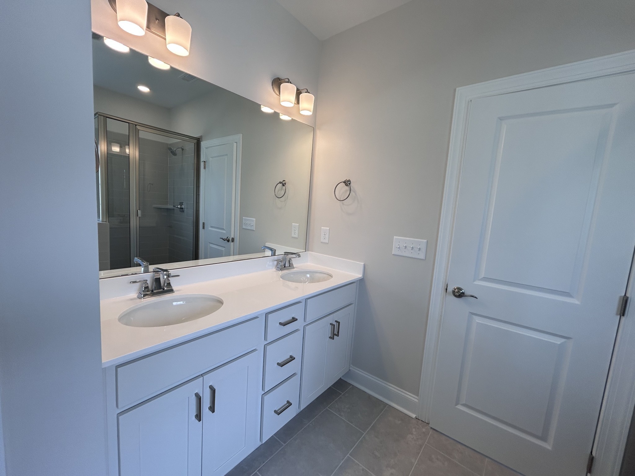 6502 Ripple Ridge Columbia, TN 38401 - Photo 27 of 52 a bathroom with a double vanity sink and a mirror