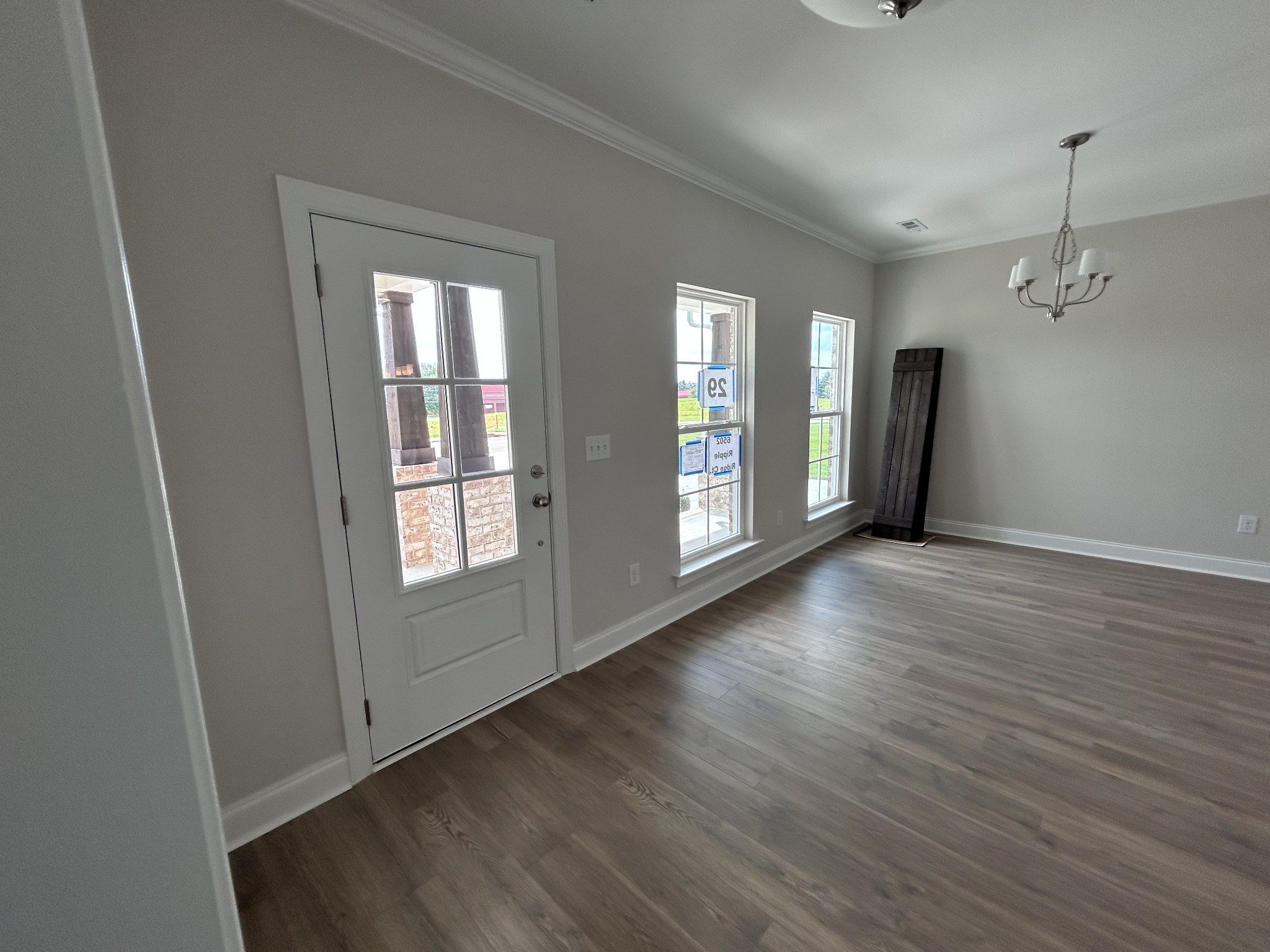6502 Ripple Ridge Columbia, TN 38401 - Photo 32 of 52 an empty room with wooden floor and windows