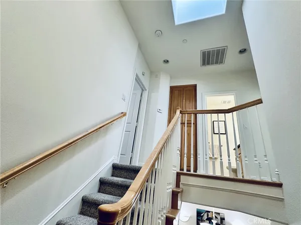 a view of stairs and furniture