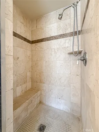 a view of deck with a table and chairs