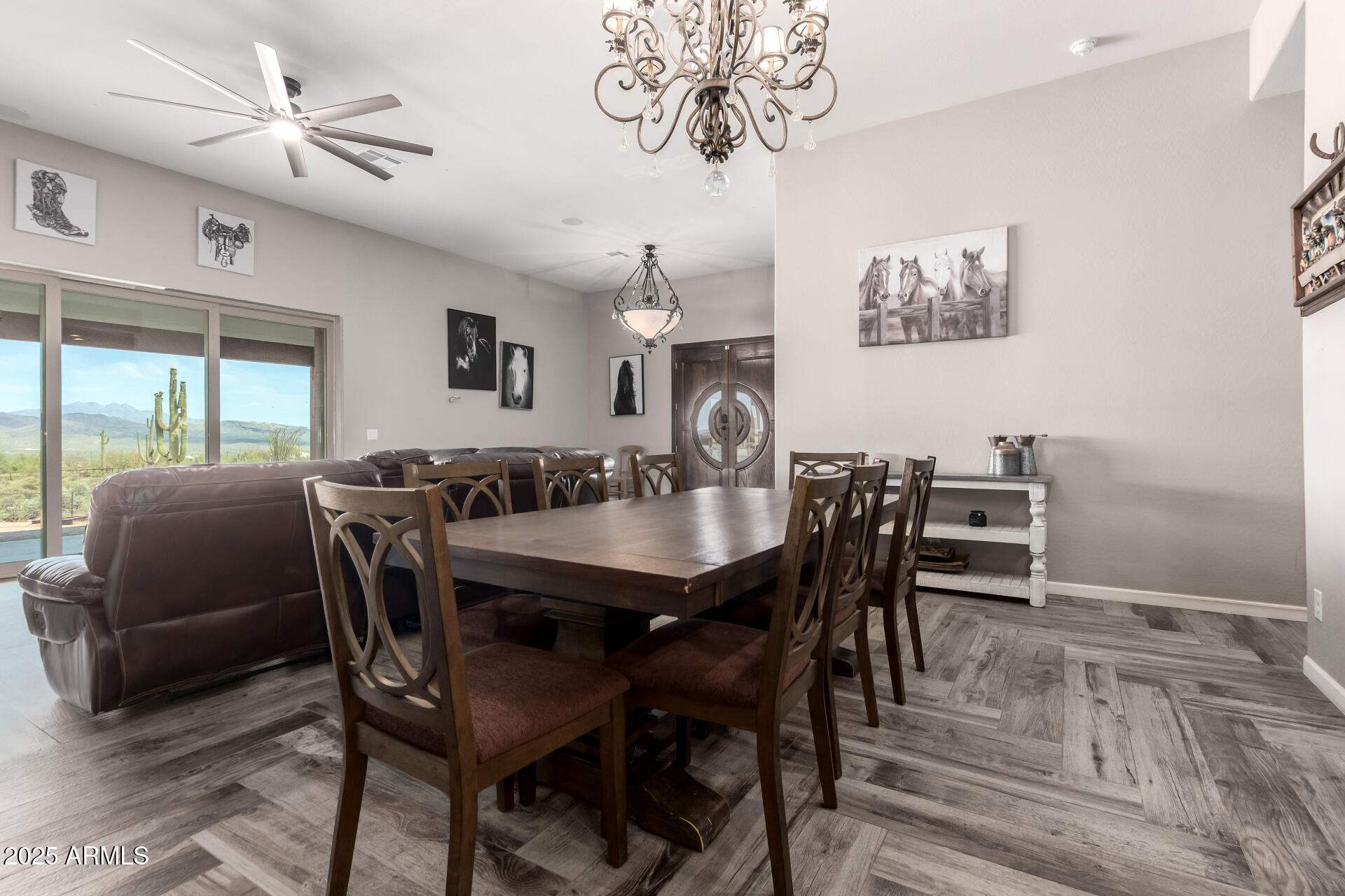 17024 East Lone Mountain Road Rio Verde, AZ 85263 - Photo 13 of 42 a view of a dining room with furniture window and wooden floor