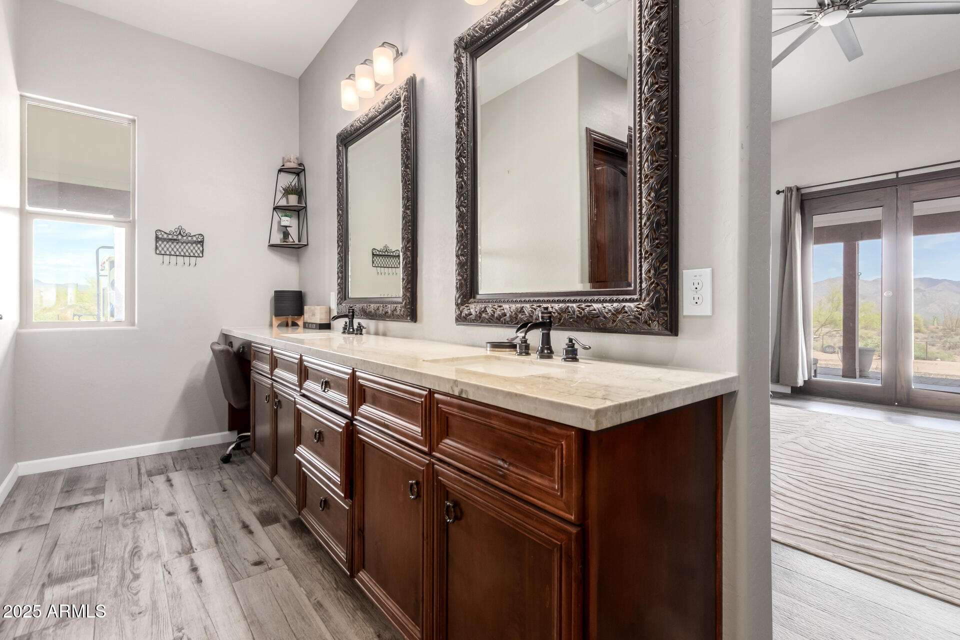 17024 East Lone Mountain Road Rio Verde, AZ 85263 - Photo 24 of 42 a bathroom with a sink and a mirror