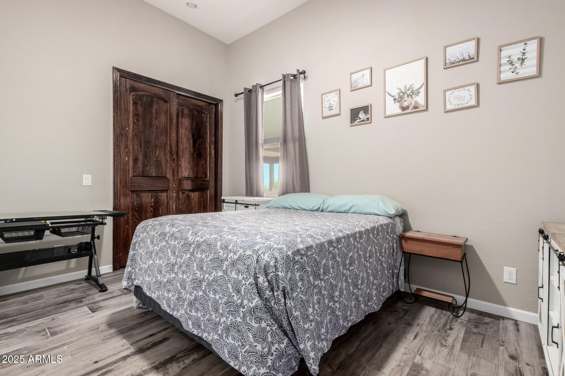 17024 East Lone Mountain Road Rio Verde, AZ 85263 - Photo 25 of 42 a bedroom with a bed and a dresser