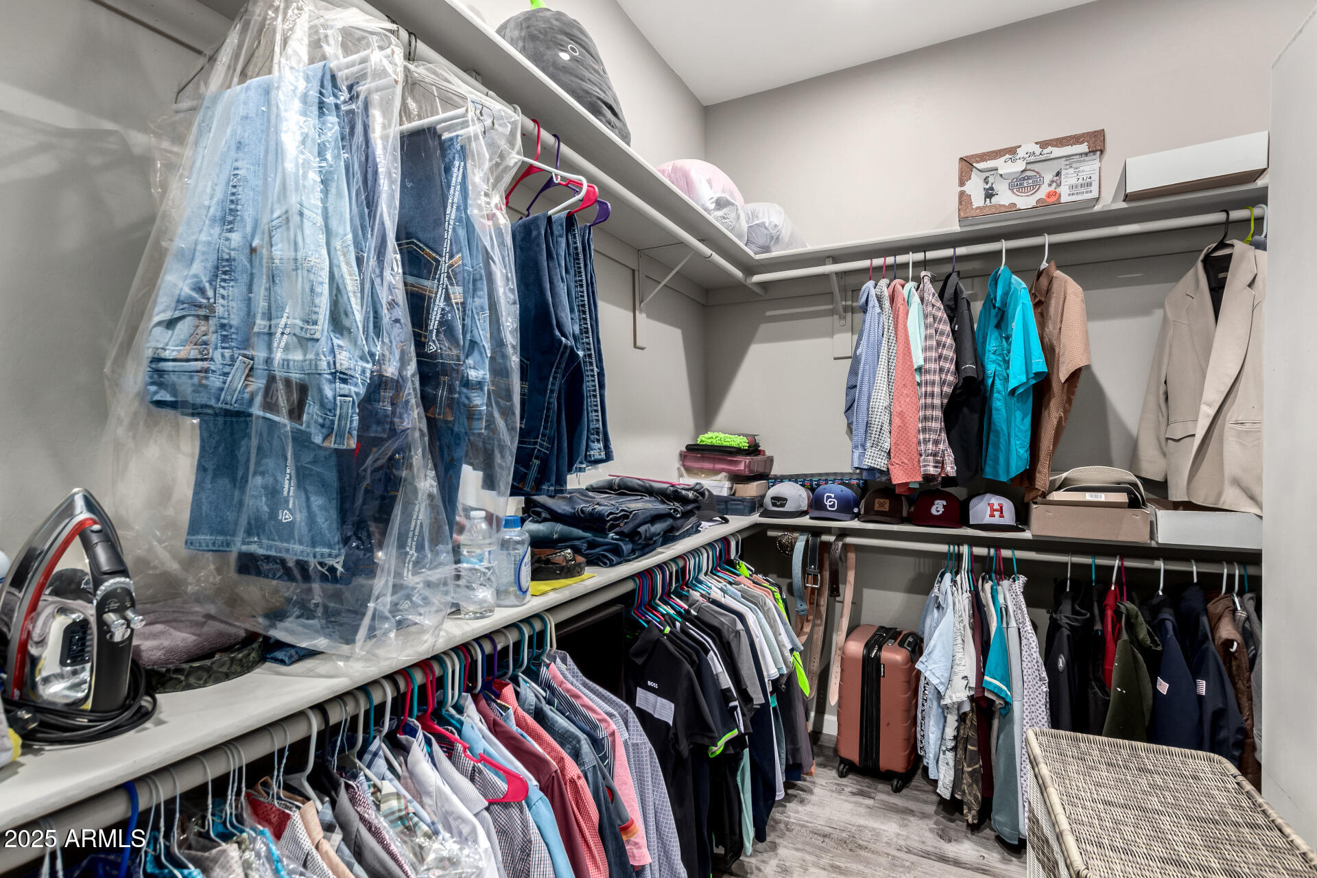 17024 East Lone Mountain Road Rio Verde, AZ 85263 - Photo 27 of 42 a view of walk in closet with clothes and shoes