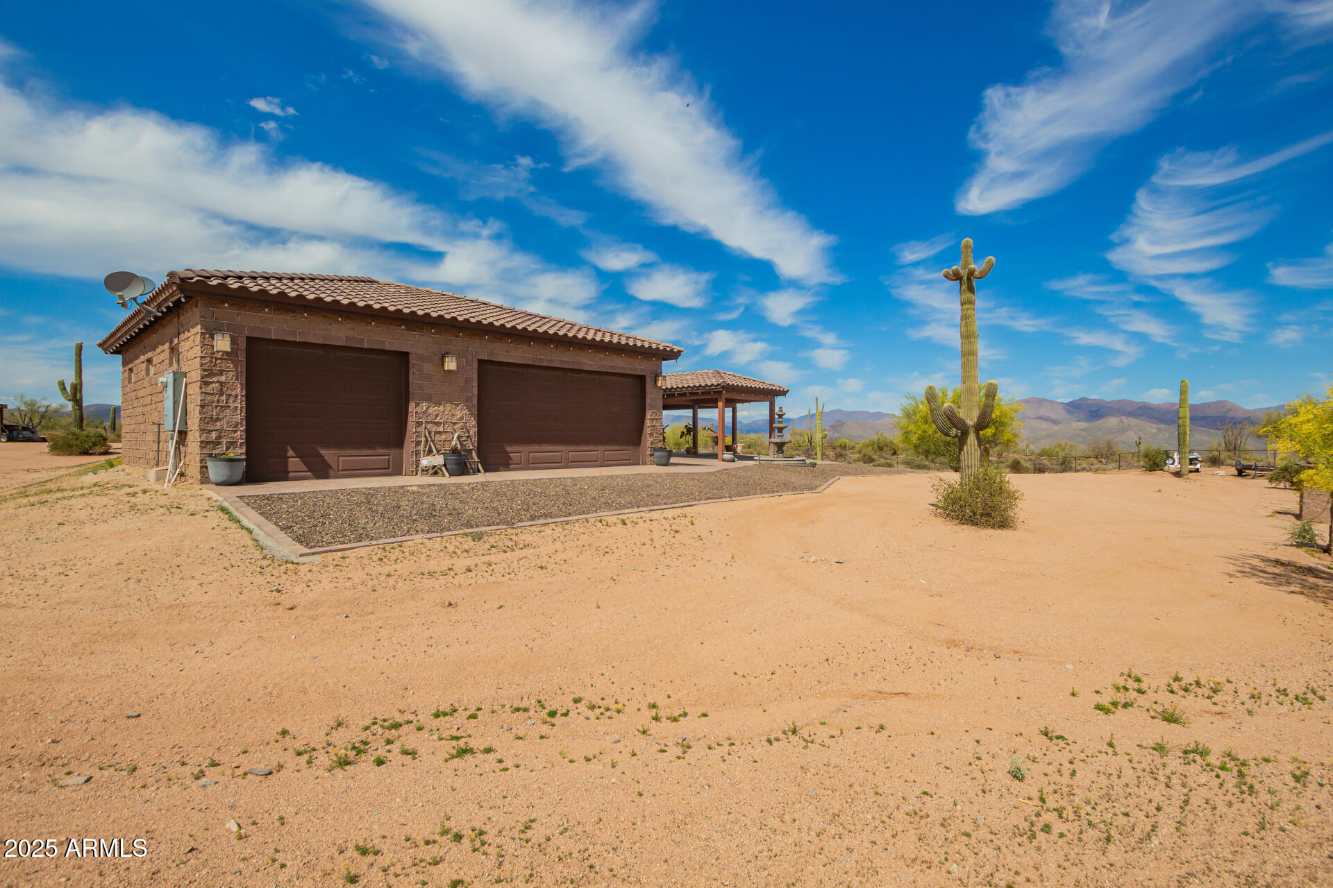 17024 East Lone Mountain Road Rio Verde, AZ 85263 - Photo 4 of 42 a view of a house with a snow in the yard