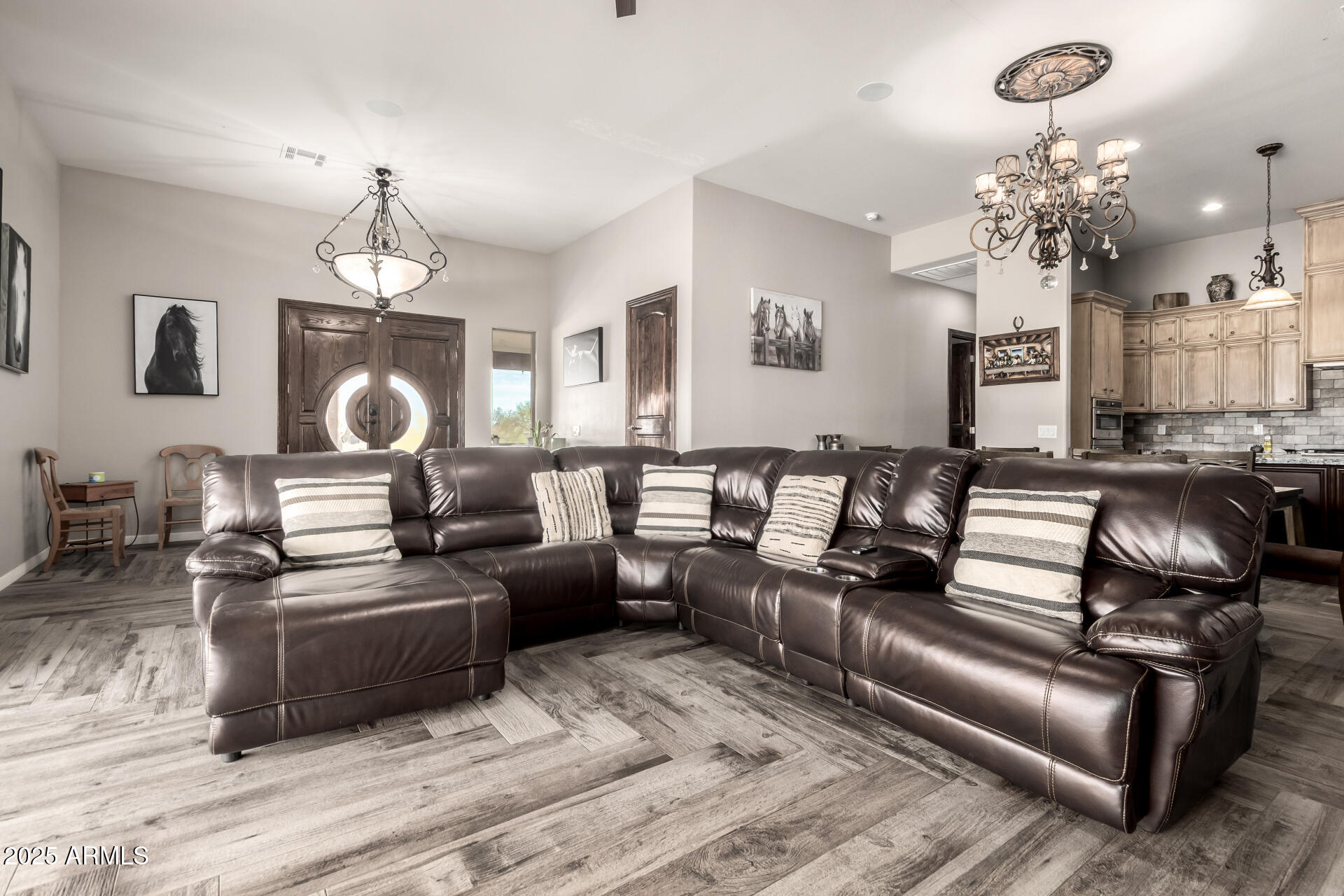 17024 East Lone Mountain Road Rio Verde, AZ 85263 - Photo 8 of 42 a living room with furniture chandelier and kitchen view