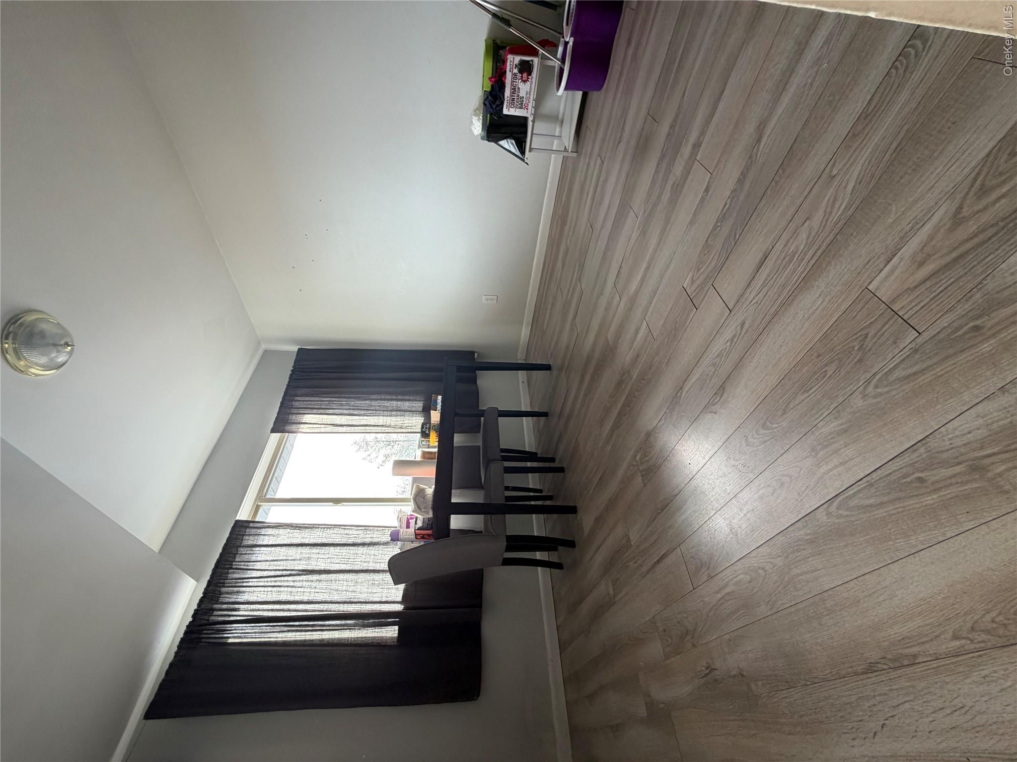 26 Cooper Road, Unit 312 Poughkeepsie, NY 12603 - Photo 9 of 13 a view of a dining room with furniture and window