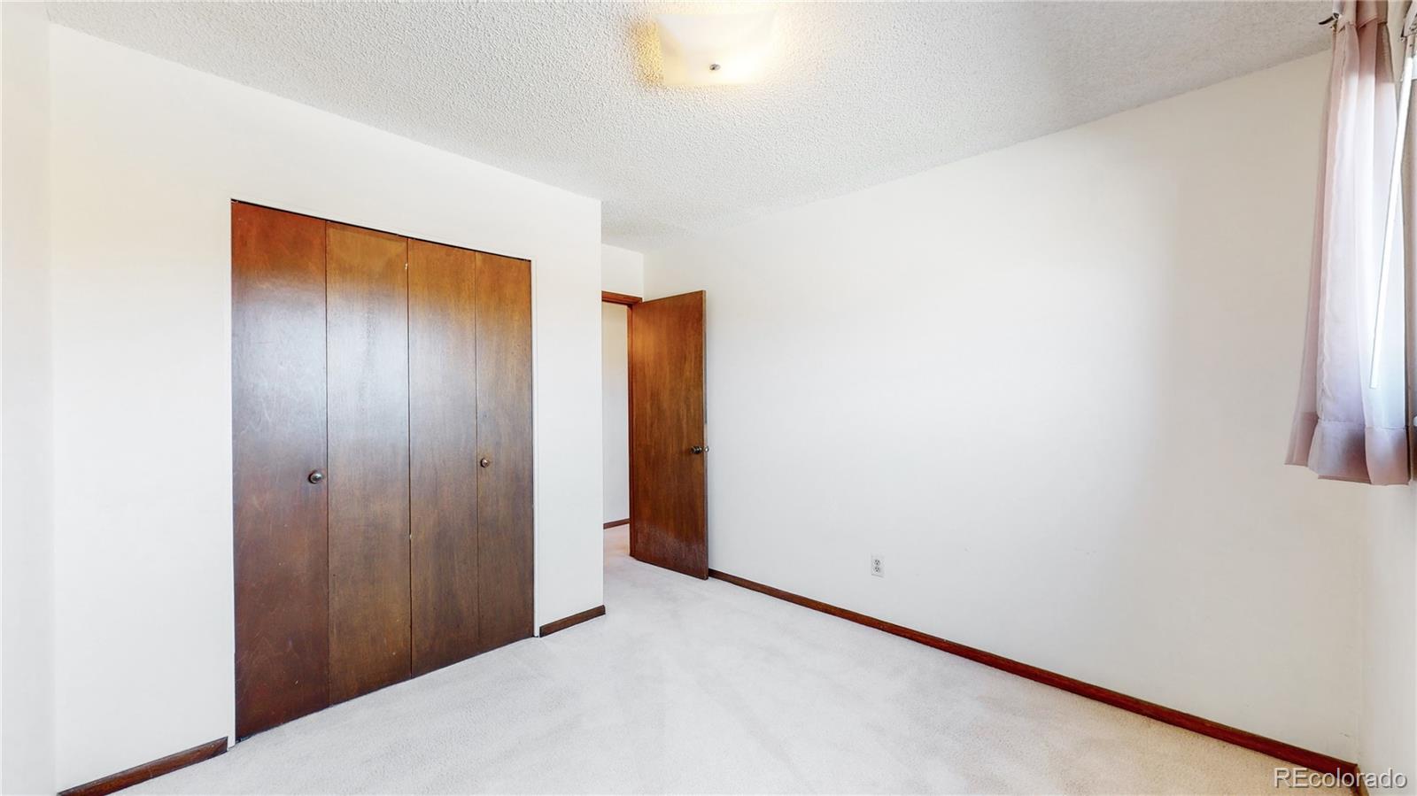 223 Holman Way Golden, CO 80401 - Photo 18 of 29 a view of an empty room
