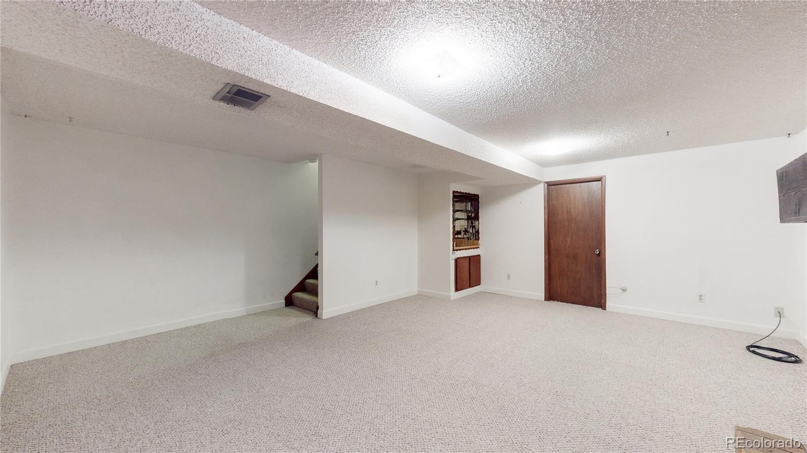 223 Holman Way Golden, CO 80401 - Photo 19 of 29 a view of an empty room
