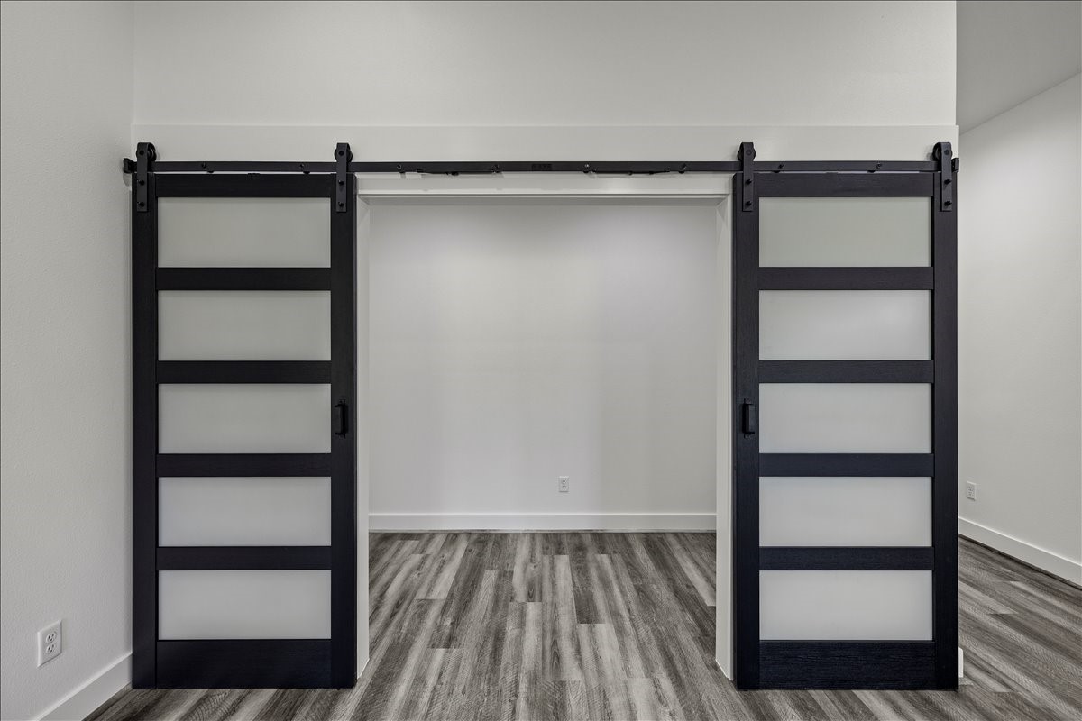 14103 3rd Street Santa Fe, TX 77517 - Photo 11 of 46 a view of a room with wooden floor